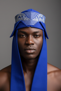 Black male model wearing blue embellished cap