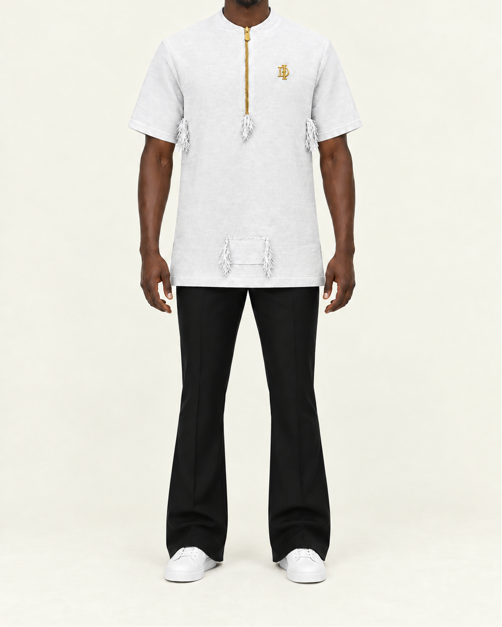 Front pose with black boot-cut pants