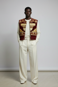 Nigerian Model – Burgundy Vest with Wide-Leg Ivory Trousers